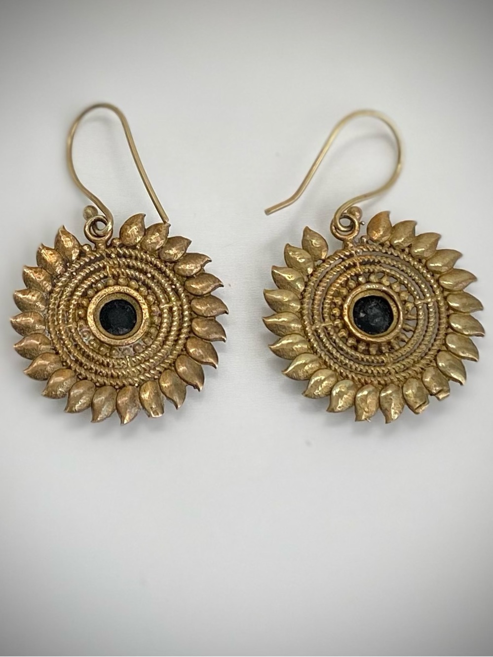 Gold Sunburst Drop Earrings with Black Onyx Stone